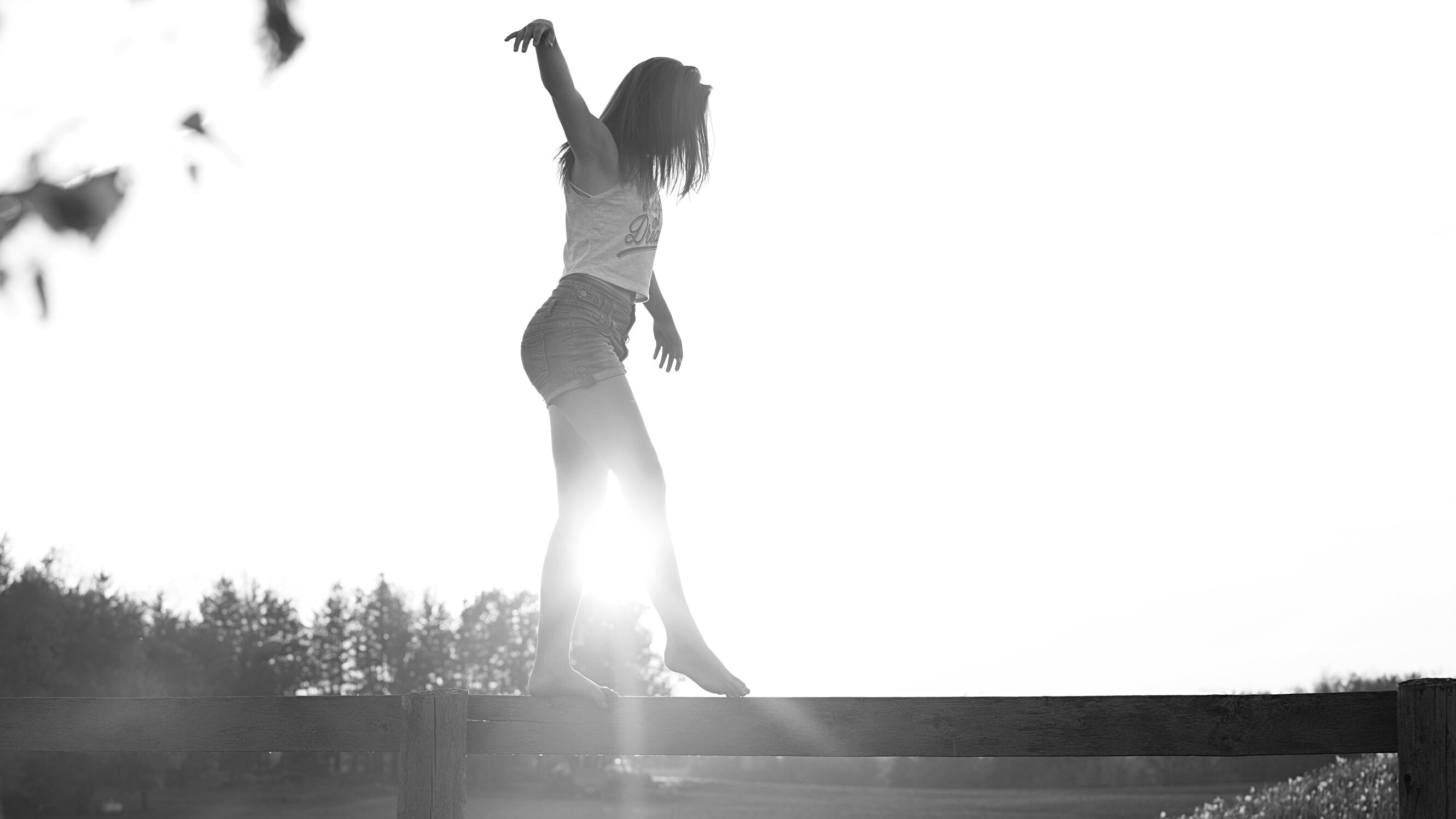 Woman Walking On Fence